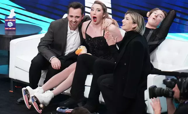 Emily Bratti and Ian Somerville react to scores after competing during the ice dance competition at the U.S. Figure Skating Championships, Thursday, Jan. 8, 2026, in St. Louis. (AP Photo/Jeff Roberson)