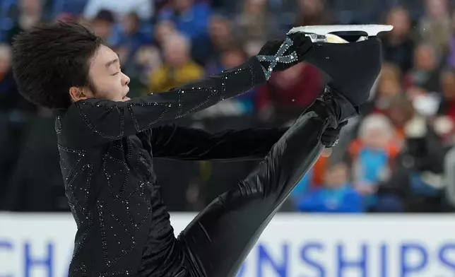 Ken Mikawa competes during the men's short program at the U.S. Figure Skating Championships, Thursday, Jan. 8, 2026, in St. Louis. (AP Photo/Stephanie Scarbrough)