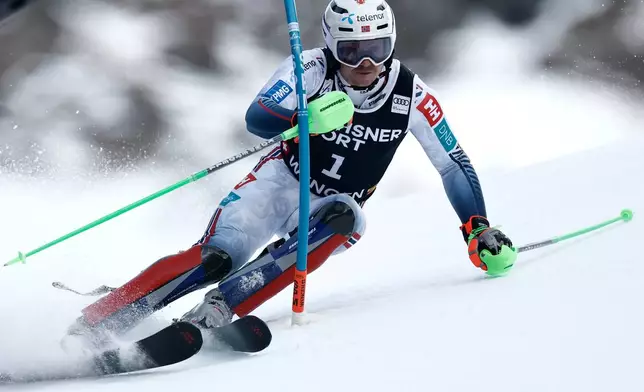 Norway's Henrik Kristoffersen competes in an alpine ski, men's World Cup slalom, in Wengen, Switzerland, Sunday, Jan. 18, 2026. (AP Photo/Gabriele Facciott)