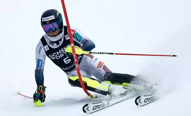 Norway's Atle Lie McGrath competes in an alpine ski, men's World Cup slalom, in Wengen, Switzerland, Sunday, Jan. 18, 2026. (AP Photo/Gabriele Facciott)