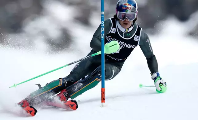 Brazil's Lucas Pinheiro Braathen competes in an alpine ski, men's World Cup slalom, in Wengen, Switzerland, Sunday, Jan. 18, 2026. (AP Photo/Gabriele Facciott)