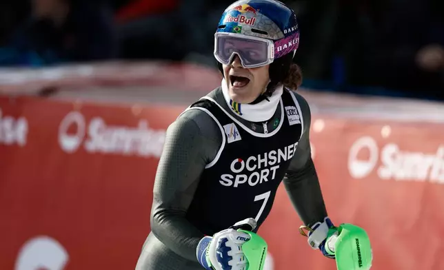 Brazil's Lucas Pinheiro Braathen celebrates at the finish area of an alpine ski, men's World Cup slalom, in Wengen, Switzerland, Sunday, Jan. 18, 2026. (AP Photo/Gabriele Facciott)