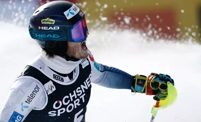 Norway's Atle Lie McGrath celebrates at the finish area of an alpine ski, men's World Cup slalom, in Wengen, Switzerland, Sunday, Jan. 18, 2026. (AP Photo/Gabriele Facciott)