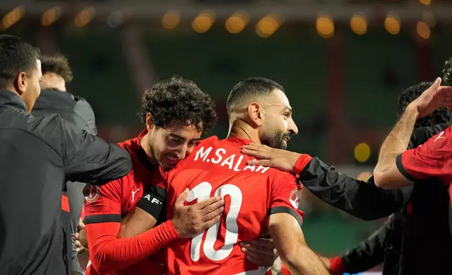 Egypt's Mohamed Salah celebrates after scoring his side's third goal during the Africa Cup of Nations round of 16 soccer match between Egypt and Benin in Agadir, Morocco, Monday, Jan. 5, 2026. (AP Photo/Mosa'ab Elshamy)