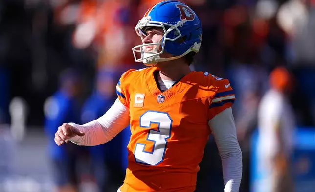 Denver Broncos placekicker Wil Lutz warms up before an NFL football game against the Los Angeles Chargers, Sunday, Jan. 4, 2026, in Denver. (AP Photo/David Zalubowski)