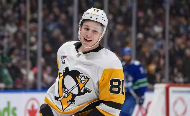 Pittsburgh Penguins' Benjamin Kindel celebrates after his goal against the Vancouver Canucks during second-period NHL hockey game action in Vancouver, British Columbia, Sunday, Jan. 25, 2026. (Darryl Dyck/The Canadian Press via AP)