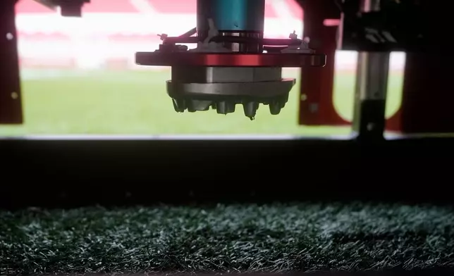 A Biomechanical Elite Athlete Shoe-Turf Tester (BEAST) is shown during a demonstration on the field at Levi's Stadium, as the turf is prepared for the NFL's Super Bowl LX football game, in Santa Clara, Calif., Tuesday, Jan. 20, 2026. (AP Photo/Jeff Chiu)