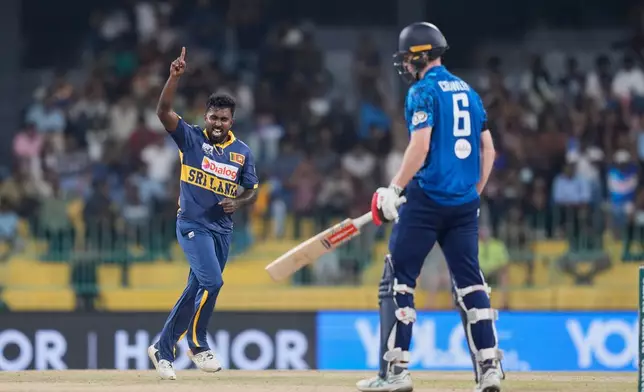 Sri Lanka's Asitha Fernando celebrates the wicket of England's Zak Crawley during the first ODI cricket match between England and Sri Lanka in Colombo, Sri Lanka, Thursday, Jan. 22, 2026. (AP Photo/Eranga Jayawardena)