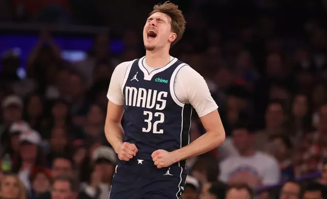 Dallas Mavericks' Cooper Flagg yells during the first half of an NBA basketball game against the New York Knicks, Monday, Jan. 19, 2026, in New York. (AP Photo/Pamela Smith)