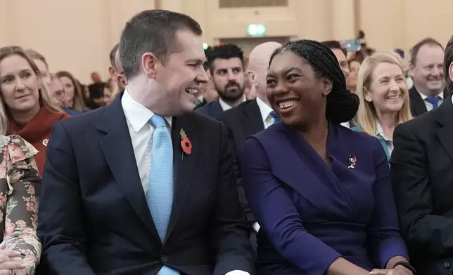 Kemi Badenoch with Robert Jenrick before being announced as the new Conservative Party leader following the vote by party members at 8 Northumberland Avenue in central London, Nov. 3, 2024. (Stefan Rousseau/PA via AP)
