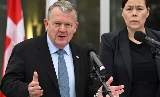 Denmark's Foreign Minister Lars Løkke Rasmussen and Greenland's Foreign Minister Vivian Motzfeldt speak at a news conference at the Embassy of Denmark, Wednesday, Jan. 14, 2026, in Washington. (AP Photo/John McDonnell)