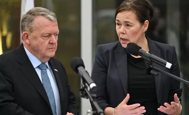 Denmark's Foreign Minister Lars Løkke Rasmussen and Greenland's Foreign Minister Vivian Motzfeldt speak at a news conference at the Embassy of Denmark, Wednesday, Jan. 14, 2026, in Washington. (AP Photo/John McDonnell)