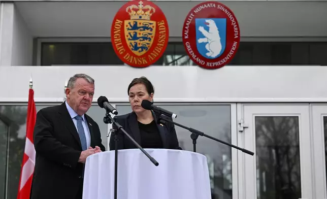 Denmark's Foreign Minister Lars Løkke Rasmussen and Greenland's Foreign Minister Vivian Motzfeldt speak at a news conference at the Embassy of Denmark, Wednesday, Jan. 14, 2026, in Washington. (AP Photo/John McDonnell)