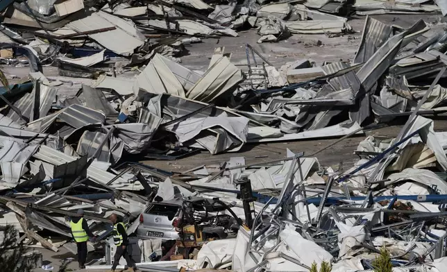 Israeli authorities demolish a UNRWA compound, belonging to the U.N. agency that assists Palestinian refugees, in east Jerusalem Tuesday, Jan. 20, 2026. (AP Photo/Mahmoud Illean)