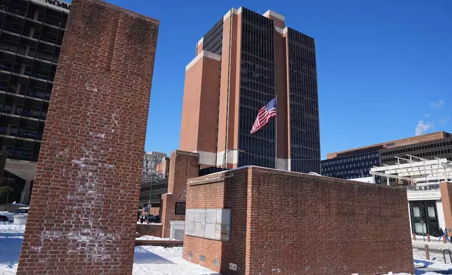 The Federal courthouse stands above the location of the now removed explanatory panels that were part of an exhibit on slavery at President's House Site in Philadelphia, Friday, Jan. 30, 2026. (AP Photo/Matt Rourke)