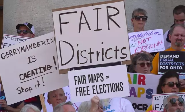 FILE - This photo taken from video shows organizers rallying outside of the Ohio Statehouse to protest gerrymandering and advocate for lawmakers to draw fair maps in Columbus, Ohio, Sept. 17, 2025. (AP Photo/Patrick Aftoora-Orsagos, File)