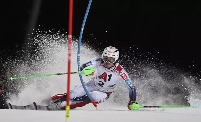 Norway's Henrik Kristoffersen competes in an alpine ski, men's World Cup slalom, in Schladming, Austria, Wednesday, Jan. 28, 2026. (AP Photo/Marco Trovati)