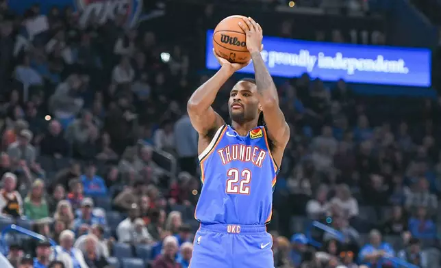 Oklahoma City Thunder guard Cason Wallace shoots during the second half of an NBA basketball game against the Portland Trail Blazers, Wednesday, Dec. 31, 2025, in Oklahoma City. (AP Photo/Kyle Phillips)