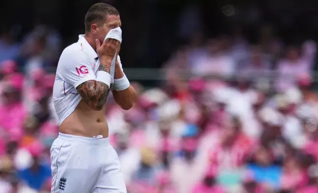 England's Brydon Carse reacts after having a video review denied by the third umpire during play on day three of the fifth and final Ashes cricket test between England and Australia in Sydney, Tuesday, Jan. 6, 2026. (AP Photo/Mark Baker)
