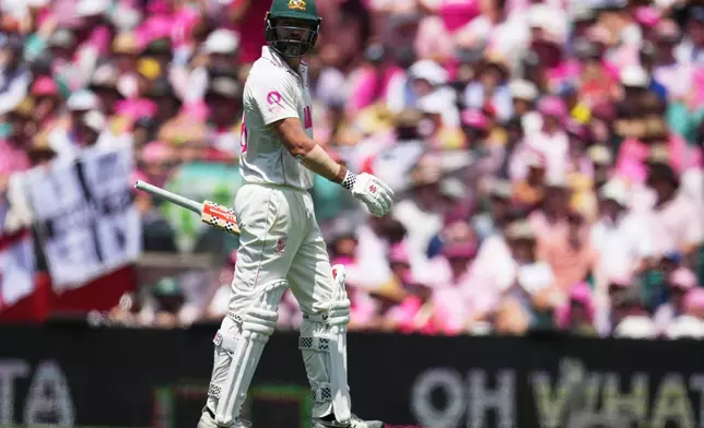 Australia's Michael Neser walks from the field after he was dismissed during play on day three of the fifth and final Ashes cricket test between England and Australia in Sydney, Tuesday, Jan. 6, 2026. (AP Photo/Mark Baker)