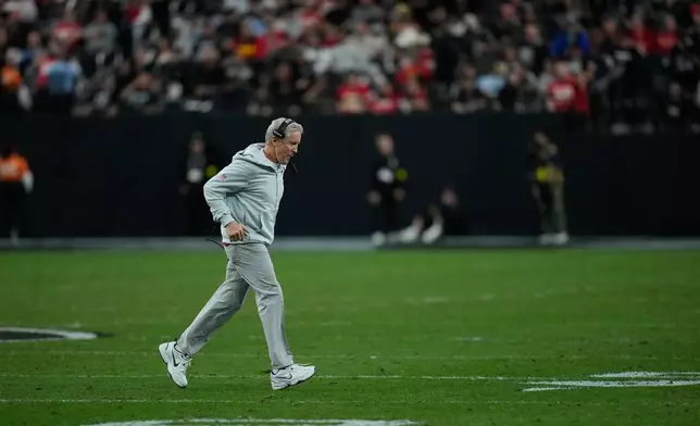 Las Vegas Raiders head coach Pete Carroll jogs on the field during timeout in the first half of an NFL football game against the Kansas City Chiefs Sunday, Jan. 4, 2026, in Las Vegas. (AP Photo/John Locher)