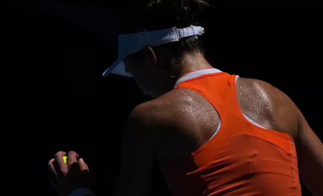Iva Jovic of the U.S. prepares to serve to Aryna Sabalenka of Belarus during their quarterfinal match at the Australian Open tennis championship in Melbourne, Australia, Tuesday, Jan. 27, 2026. (AP Photo/Dar Yasin)
