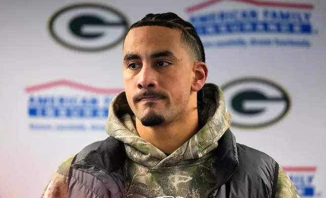 Green Bay Packers' Jordan Love talks after an NFL wild-card playoff football game against the Chicago Bears Saturday, Jan. 10, 2026, in Chicago. (AP Photo/Erin Hooley)