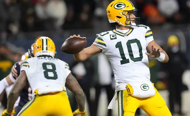 Green Bay Packers' Jordan Love throws during the second half of an NFL wild-card playoff football game against the Chicago Bears Saturday, Jan. 10, 2026, in Chicago. (AP Photo/Nam Huh)