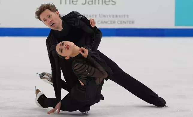 Madison Chock and Evan Bates skate during the free dance competition at the U.S. Figure Skating Championships, Saturday, Jan. 10, 2026, in St. Louis. (AP Photo/Stephanie Scarbrough)