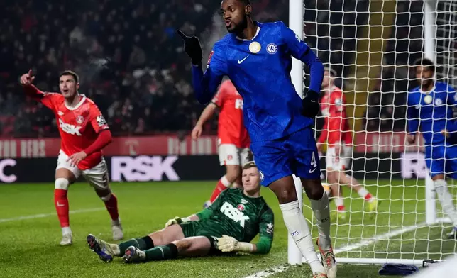 Chelsea's Tosin Adarabioyo celebrates scoring his team's second goal of the game during the English FA Cup third round soccer match between Charlton Athletic and Chelsea in London, Saturday Jan. 10, 2026. (John Walton/PA via AP)