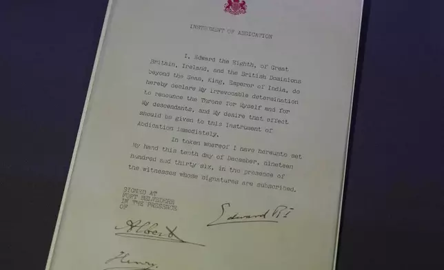 The Abdication document of Britain's King Edward VIII on display during a preview of an exhibition entitled Love Letters at the National Archives in London, Wednesday, Jan. 21, 2026, Edward abdicated on Dec. 10, 1936. (AP Photo/Alastair Grant)