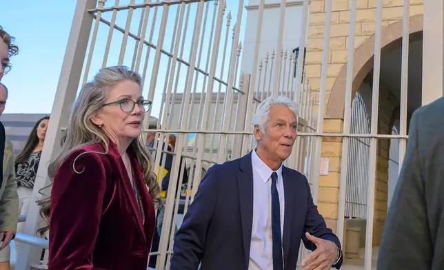 Actor Timothy Busfield's lawyer Larry Stein stands in front of the Bernalillo County Courthouse, Tuesday Jan. 20, 2026, in Albuquerque, N.M. (AP Photo/Roberto E. Rosales)