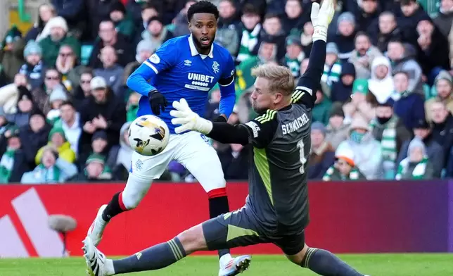 Rangers' Youssef Chermiti scores their side's second goal of the game during the Scottish Premiership soccer match between Celtic and Rangers in Glasgow, Scotland, Saturday, Jan. 3, 2026. (Andrew Milligan/PA via AP)