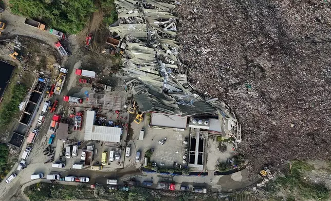 An aerial view after a huge mound of garbage collapsed at a waste segregation facility in Binaliw, Cebu city on Friday, Jan. 9, 2026. (AP Photo/Jacqueline Hernandez)