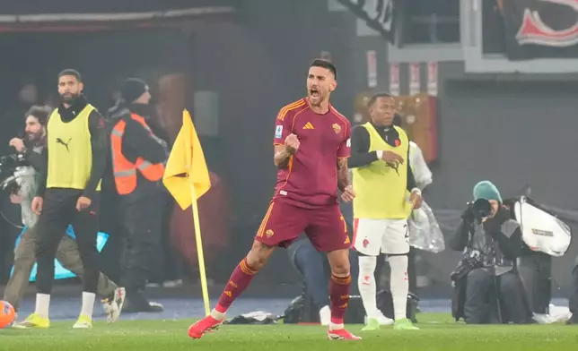 Roma's Lorenzo Pellegrini, celebrates after scoring his side's first goal during the Serie A soccer match between Roma and AC Milan in Rome, Sunday, Jan. 25, 2026. (AP Photo/Gregorio Borgia)