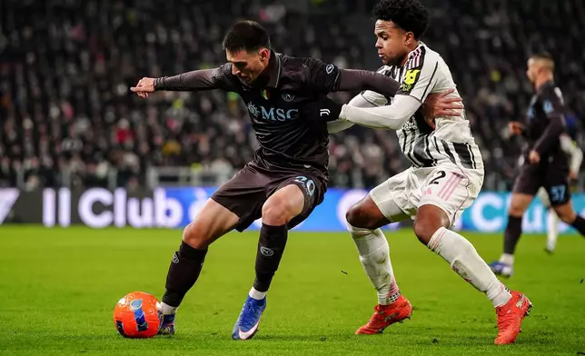 Napoli's Eljif Elmas fights for the ball with Juventus' Weston McKennie, right, during the Italian Serie A soccer match between Juventus and Napoli in Turin, Italy, Sunday, Jan. 25, 2026. (Marco Alpozzi/LaPresse via AP)