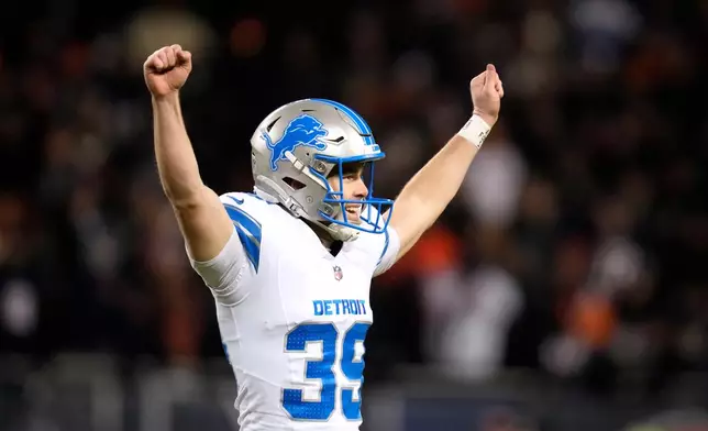 Detroit Lions place kicker Jake Bates celebrates after kicking a field goal on the final play of an NFL football game against the Chicago Bears, Sunday, Jan. 4, 2026, in Chicago. (AP Photo/Erin Hooley)