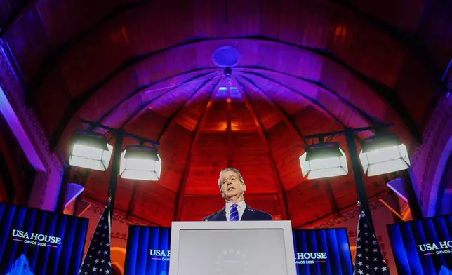 US Treasury Secretary Scott Bessent speaks at the USA house during the Annual Meeting of the World Economic Forum in Davos, Switzerland, Wednesday, January. 21, 2026. (AP Photo/Markus Schreiber)