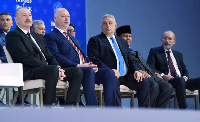 From right, Ayman Al Safadi, Deputy PM of of Jordan, Prabowo Subinato, President of Indonesia, Hungary's Prime Minister Viktor Orban, Bulgaria's Prime Minister Rossen Jeliazkov and Ilham Aliyev, President attend a Board of Peace charter announcement during the Annual Meeting of the World Economic Forum in Davos, Switzerland, Thursday, Jan. 22, 2026. (AP Photo/Evan Vucci)