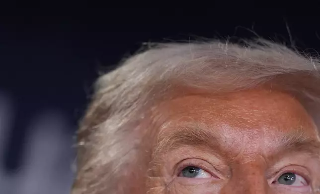 President Donald Trump speaks during a meeting of Global Business Leaders at the Annual Meeting of the World Economic Forum in Davos, Switzerland, Wednesday, Jan. 21, 2026. (AP Photo/Evan Vucci)