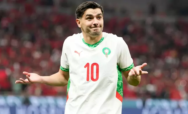 Morocco's Brahim Abdelkader Díaz celebrates after scoring his side's opening goal during the Africa Cup of Nations quarterfinal soccer match between Cameroon and Morocco, in Rabat, Morocco, Friday, Jan. 9, 2026. (AP Photo/Mosa'ab Elshamy)