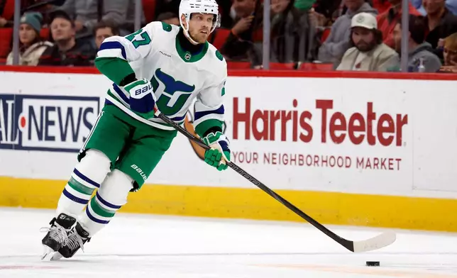 Carolina Hurricanes' Nikolaj Ehlers controls the puck during the second period of an NHL hockey game against the Utah Mammoth in Raleigh, N.C., Thursday, Jan. 29, 2026. (AP Photo/Karl DeBlaker)