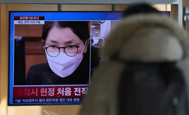 A TV screen shows a file footage of Kim Keon Hee, the wife of South Korea's former President Yoon Suk Yeol during a news program at the Seoul Railway Station in Seoul, South Korea, Wednesday, Jan. 28, 2026. (AP Photo/Lee Jin-man)