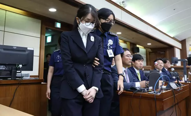 FILE - Kim Keon Hee, the wife of South Korea's jailed former President Yoon Suk Yeol, arrives for her first trial hearing on corruption charges at a courtroom of the Seoul Central District Court on Sept. 24, 2025 in Seoul, South Korea.(Chung Sung-Jun/Pool Photo via AP, File)
