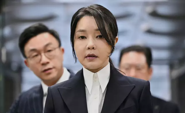 FILE - South Korea's former first lady Kim Keon Hee, wife of former president Yoon Suk Yeol, arrives at a court to attend a hearing to review her arrest warrant requested by special prosecutors, in Seoul, South Korea, on Aug. 12, 2025. (Jung Yeon-je/Pool Photo via AP, File)