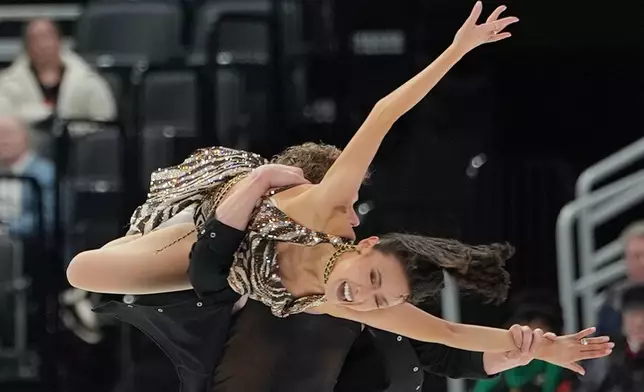 Madison Chock and Evan Bates compete during the ice dance competition at the U.S. Figure Skating Championships, Thursday, Jan. 8, 2026, in St. Louis. (AP Photo/Stephanie Scarbrough)