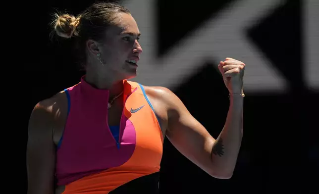 Aryna Sabalenka of Belarus reacts after defeating Iva Jovic of the U.S. in their quarterfinal match at the Australian Open tennis championship in Melbourne, Australia, Tuesday, Jan. 27, 2026. (AP Photo/Aaron Favila)