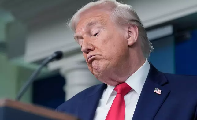 President Donald Trump speaks in the James Brady Press Briefing Room at the White House, Tuesday, Jan. 20, 2026, in Washington. (AP Photo/Alex Brandon)