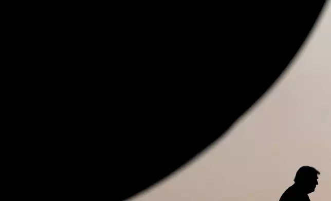 FILE - President Donald Trump boards Air Force One at Joint Base Andrews, Md., Aug. 15, 2025. (AP Photo/Julia Demaree Nikhinson, File)