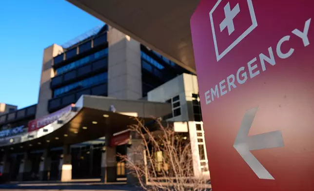 The Hennepin County Medical Center emergency department sign is seen Friday, Jan. 30, 2026, in Minneapolis. (AP Photo/Julia Demaree Nikhinson)